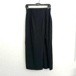 Cachet black knit skirt w/ dramatic slit and peek- a- boo stretch lace